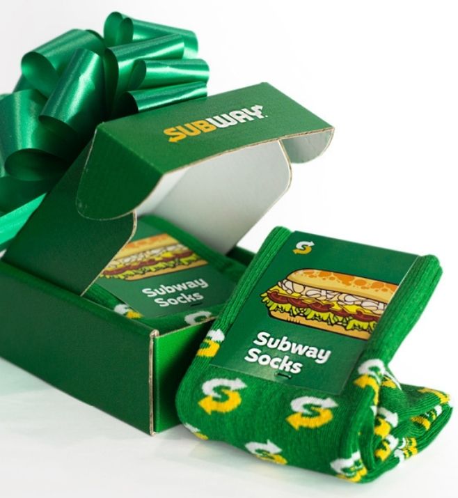 Custom Subway socks displayed with branded gift packaging