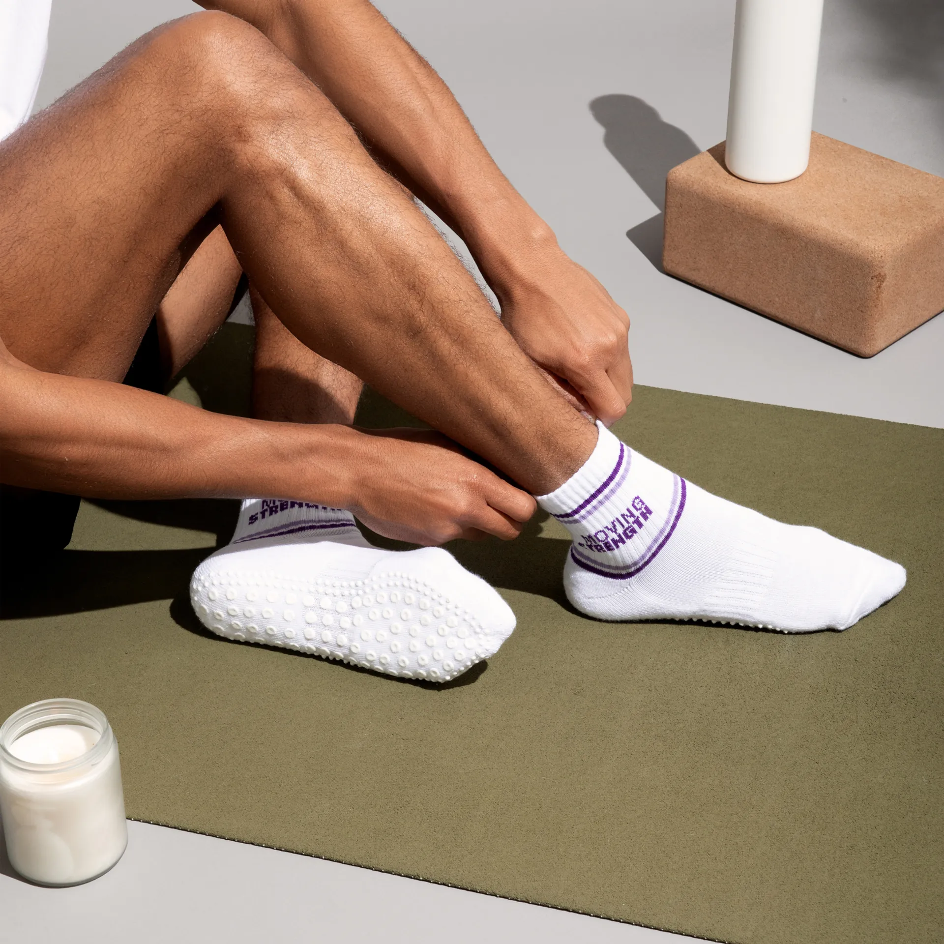 Custom grip socks with anti-slip soles being worn
