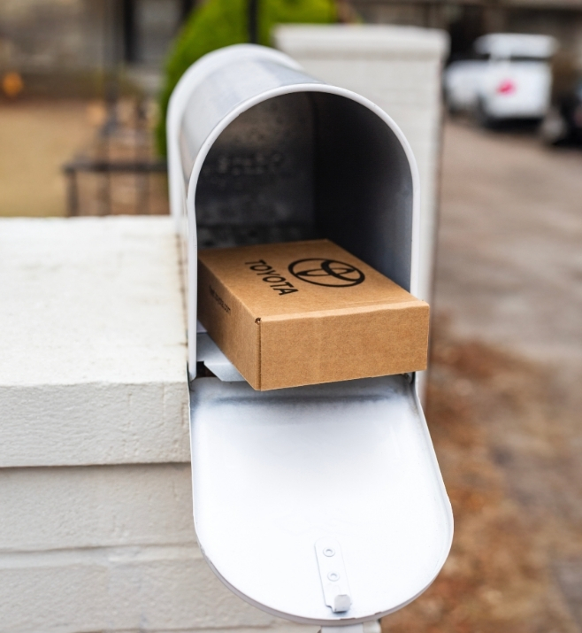Employee welcome package delivered to a home mailbox