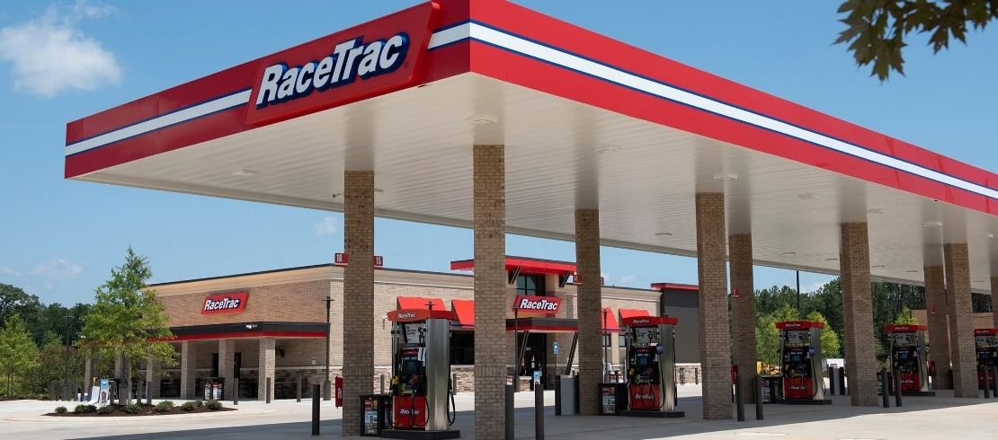 RaceTrac convenience store and fuel station under a blue sky