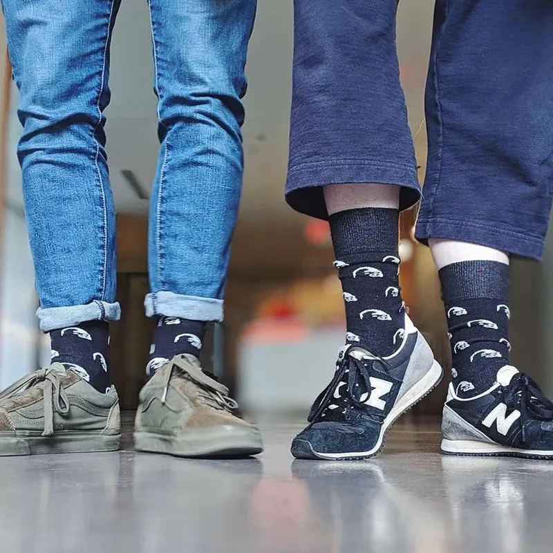 Custom Crew Socks - Flagship group display showing multiple pairs of custom branded socks