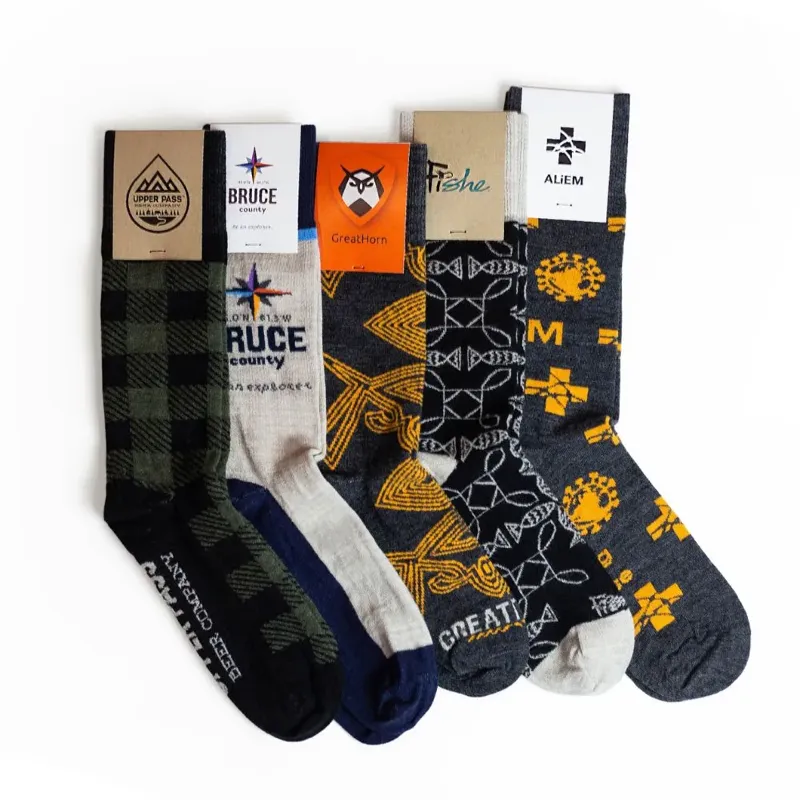 Custom Wool Crew Socks group display showing multiple pairs of custom branded socks