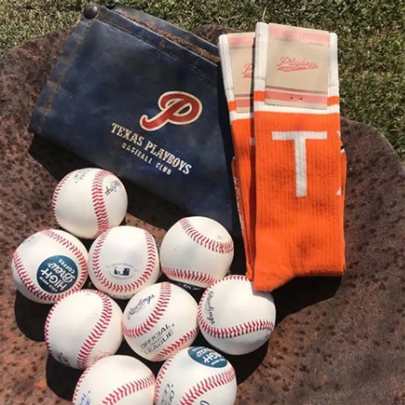 Custom baseball team socks with a team bag and baseballs